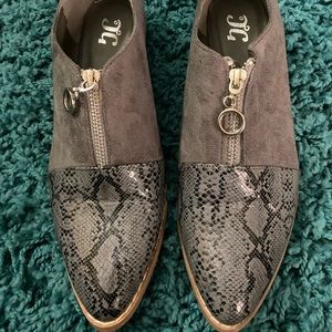 Snakeskin tipped flats